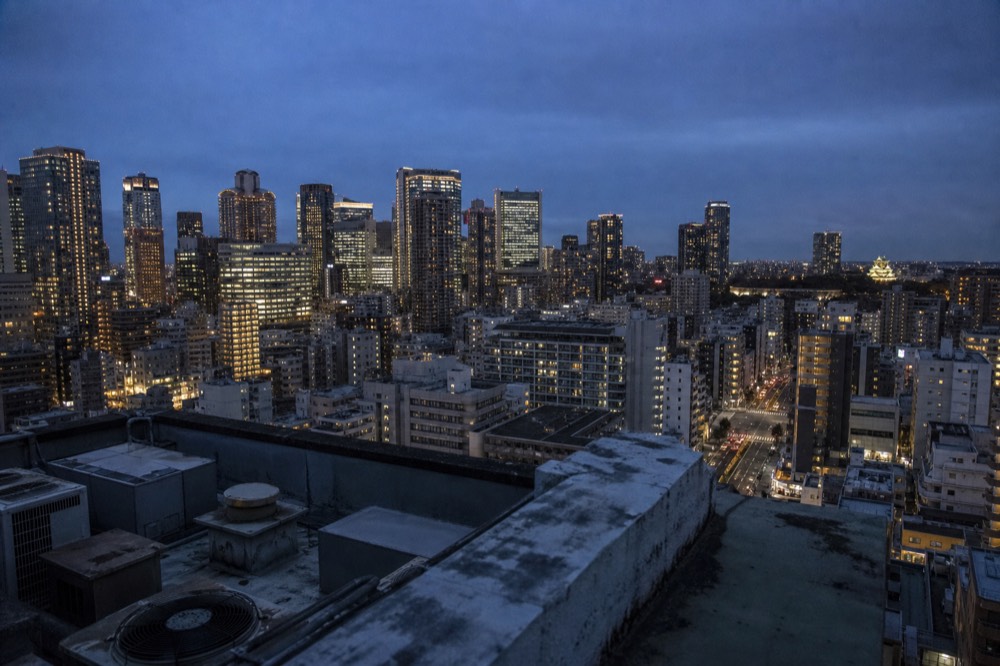 Apartment and office towers around Umeda station seen from a rooftop in northern Osaka
